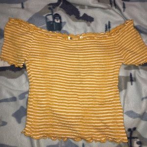 A mustered yellow striped shirt